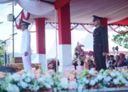 Khidmat dan Penuh Semangat, Wabup Boltara Aditya Pontoh Pimpin Upacara Penurunan Bendera HUT ke-80 RI